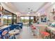 Retro-inspired dining area with a diner motif, including booths, barstools, and lake views at 5050 Surfside Cir, Lakewood Ranch, FL 34211
