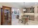 Charming breakfast nook with decorative hutch and glass table set at 5050 Surfside Cir, Lakewood Ranch, FL 34211
