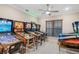 Spacious game room featuring a variety of pinball machines for entertainment, set up for enjoyment at 5050 Surfside Cir, Lakewood Ranch, FL 34211