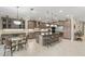 Spacious kitchen with modern appliances, a center island with seating, and ample counter space at 5050 Surfside Cir, Lakewood Ranch, FL 34211