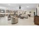Spacious living space with kitchen, dining, and seating areas for entertaining at 5050 Surfside Cir, Lakewood Ranch, FL 34211