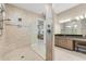Luxurious main bathroom with large walk-in shower and dual vanities at 5050 Surfside Cir, Lakewood Ranch, FL 34211
