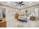 Main bedroom with trey ceiling, decorative furnishings, and en suite bath at 5050 Surfside Cir, Lakewood Ranch, FL 34211