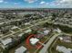 Aerial view of the home and surrounding neighborhood at 740 Floral Ln, Port Charlotte, FL 33952