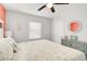 King-size bed in a bedroom with coastal decor and a gray and white color scheme at 740 Floral Ln, Port Charlotte, FL 33952