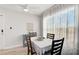 Bright dining room with table and chairs, featuring coastal decor at 740 Floral Ln, Port Charlotte, FL 33952