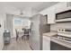 Clean and bright kitchen with stainless steel appliances at 740 Floral Ln, Port Charlotte, FL 33952