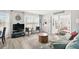 Living room with a TV, comfy seating and coastal decor at 740 Floral Ln, Port Charlotte, FL 33952