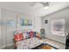 Sunroom with sleeper sofa and nautical decor at 740 Floral Ln, Port Charlotte, FL 33952
