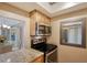 Kitchen features granite countertops and stainless steel appliances at 8625 Midnight Pass Rd # 505B, Sarasota, FL 34242