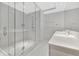 Modern bathroom features a large, bright, glass walk-in shower at 111 S Pineapple Ave # 1018, Sarasota, FL 34236