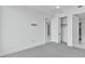 Bright bedroom features a closet and ensuite bathroom entrance at 111 S Pineapple Ave # 1018, Sarasota, FL 34236