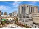 Exterior building view showcasing the architectural details, surrounding cityscape, and beautiful skyline at 111 S Pineapple Ave # 1018, Sarasota, FL 34236