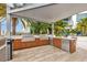 State-of-the-art outdoor kitchen featuring stainless steel appliances and ample counter space at 111 S Pineapple Ave # 1018, Sarasota, FL 34236