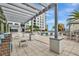 Large pool deck area, surrounded by resort-style seating and lush landscaping at 111 S Pineapple Ave # 1018, Sarasota, FL 34236