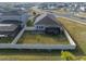 Aerial view showing home's backyard and neighborhood setting at 11160 Fieldstone Dr, Palmetto, FL 34221