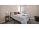 Cozy bedroom with double bed and nightstand at 11160 Fieldstone Dr, Palmetto, FL 34221