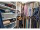 Spacious walk-in closet with ample shelving and hanging space at 11160 Fieldstone Dr, Palmetto, FL 34221