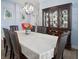 Bright dining room with a china cabinet and large windows at 11160 Fieldstone Dr, Palmetto, FL 34221