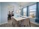 Elegant dining room with a large table and chandelier at 11160 Fieldstone Dr, Palmetto, FL 34221