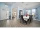 Formal dining room with dark wood table and chairs at 11160 Fieldstone Dr, Palmetto, FL 34221