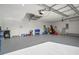 Bright and spacious garage with ample storage space and a utility sink at 11160 Fieldstone Dr, Palmetto, FL 34221
