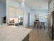 Open kitchen with a large island and breakfast bar at 11160 Fieldstone Dr, Palmetto, FL 34221