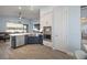 Bright kitchen with stainless steel appliances and a large island at 11160 Fieldstone Dr, Palmetto, FL 34221