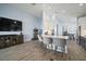 Modern kitchen with an island and breakfast bar, open to living area at 11160 Fieldstone Dr, Palmetto, FL 34221