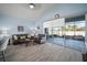 Relaxing living room showcasing sliding glass doors and backyard access at 11160 Fieldstone Dr, Palmetto, FL 34221