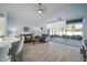 Spacious living room with sliding glass doors opening to a patio at 11160 Fieldstone Dr, Palmetto, FL 34221