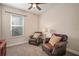 Bright office space with two leather chairs and a window at 11160 Fieldstone Dr, Palmetto, FL 34221