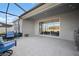Screened-in patio with access to interior living space at 11160 Fieldstone Dr, Palmetto, FL 34221