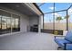 Outdoor patio with seating area and built-in grill at 11160 Fieldstone Dr, Palmetto, FL 34221