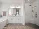 Large walk-in shower with glass enclosure and built-in seat at 11160 Fieldstone Dr, Palmetto, FL 34221