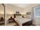 Cozy guest bedroom with a full-size bed, nightstands, and ample closet space at 13789 Old Creek Ct, Parrish, FL 34219