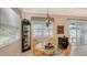Charming breakfast nook featuring a glass table and wicker chairs at 13789 Old Creek Ct, Parrish, FL 34219