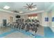 Well-equipped gym with various exercise machines at 13789 Old Creek Ct, Parrish, FL 34219