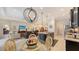 Island kitchen with breakfast bar and views into living room at 13789 Old Creek Ct, Parrish, FL 34219