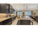 Well-equipped kitchen featuring granite counters and dark wood cabinetry at 13789 Old Creek Ct, Parrish, FL 34219