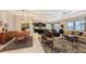 Open living space seamlessly connecting the dining area, kitchen, and living room at 13789 Old Creek Ct, Parrish, FL 34219