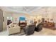Open concept living room, showing access to main bedroom and dining area at 13789 Old Creek Ct, Parrish, FL 34219
