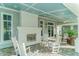 Relaxing outdoor patio with fireplace and seating area at 13789 Old Creek Ct, Parrish, FL 34219