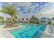 Large community pool with a lap lane and plenty of lounge chairs at 13789 Old Creek Ct, Parrish, FL 34219