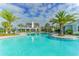 Inviting community pool with surrounding lounge chairs at 13789 Old Creek Ct, Parrish, FL 34219