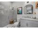 Clean bathroom with a walk-in shower and modern vanity at 17424 Cresswind Ter, Bradenton, FL 34211