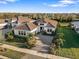 Luxury home with tile roof, three car garage, and lush landscaping at 17424 Cresswind Ter, Bradenton, FL 34211