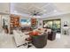 Spacious living room featuring a fireplace and built-in shelving at 17424 Cresswind Ter, Bradenton, FL 34211