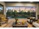 Relaxing screened-in pool area with comfortable seating and lush landscaping at 17424 Cresswind Ter, Bradenton, FL 34211