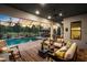 Spacious pool and patio area with seating, covered lanai, and sunset view at 17424 Cresswind Ter, Bradenton, FL 34211